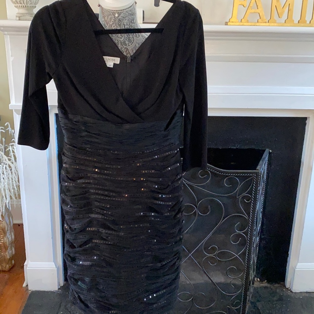 LBD party dress with sequins. Beautiful and classy with v-neck. Never worn.